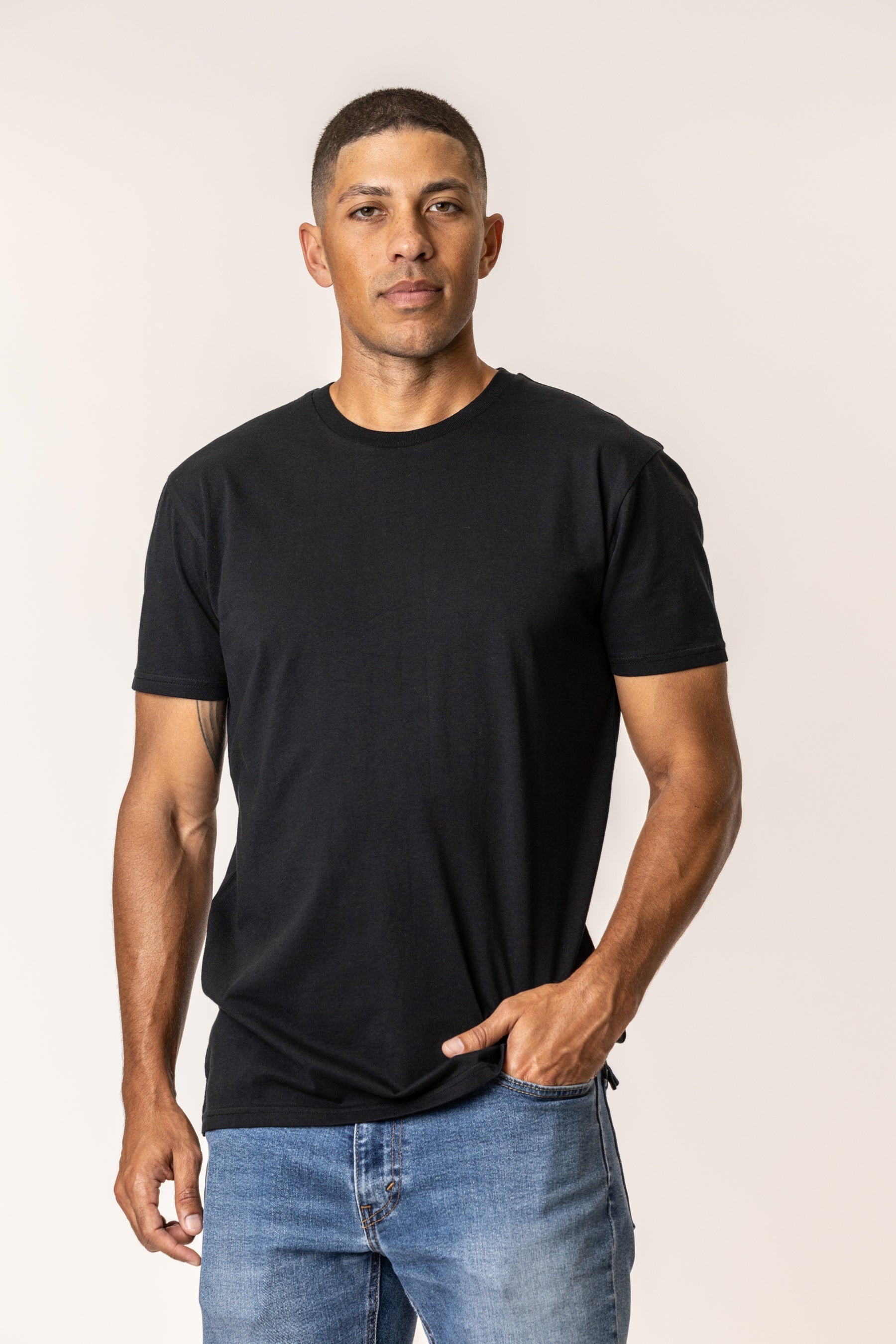 man wearing organic cotton t-shirt in black color