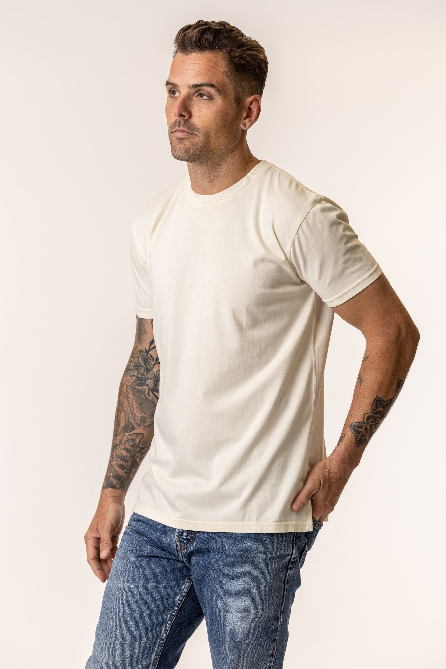 Man wearing a regenerative organic cotton natural color t-shirt