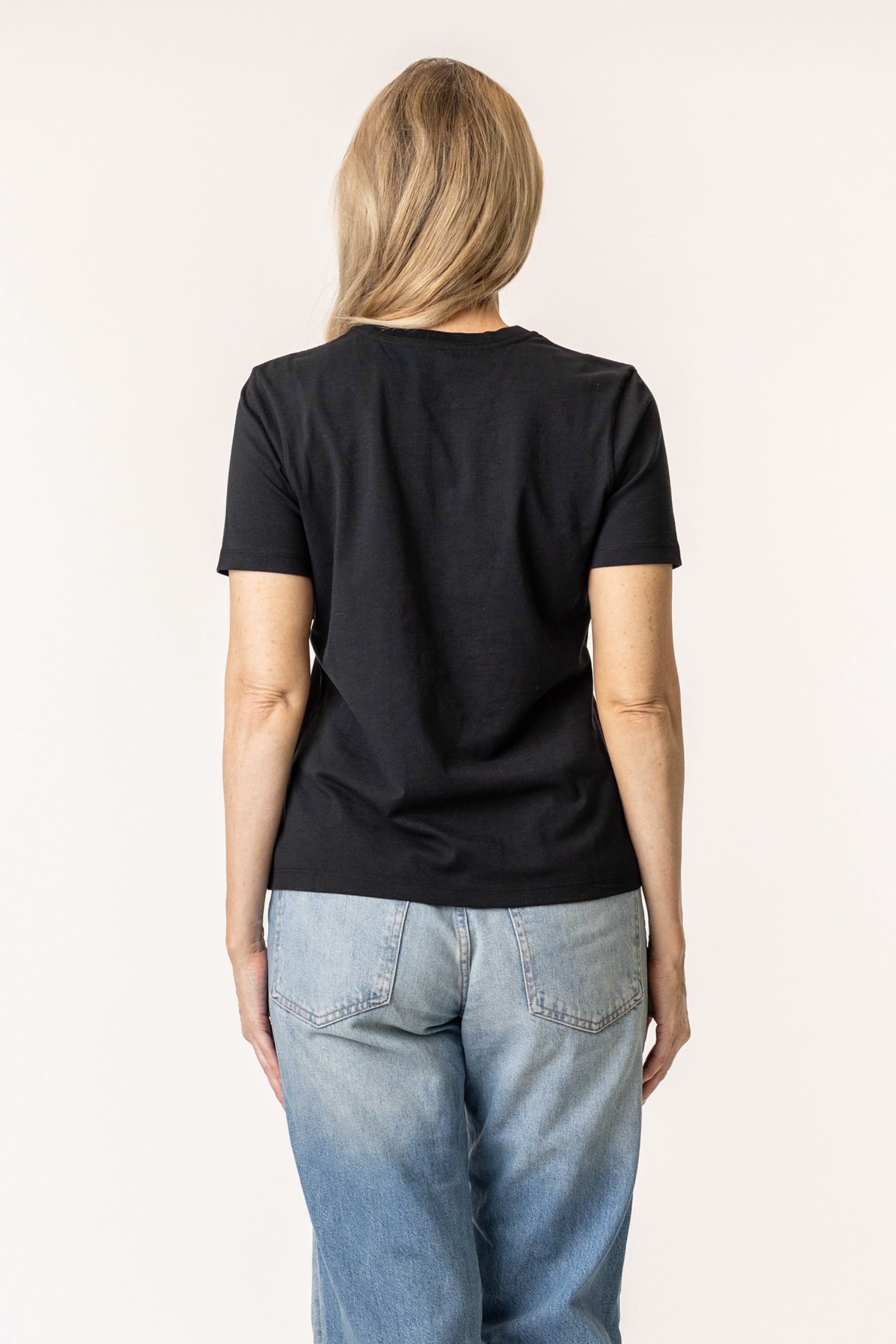 back view of black organic cotton t-shirt from vottera