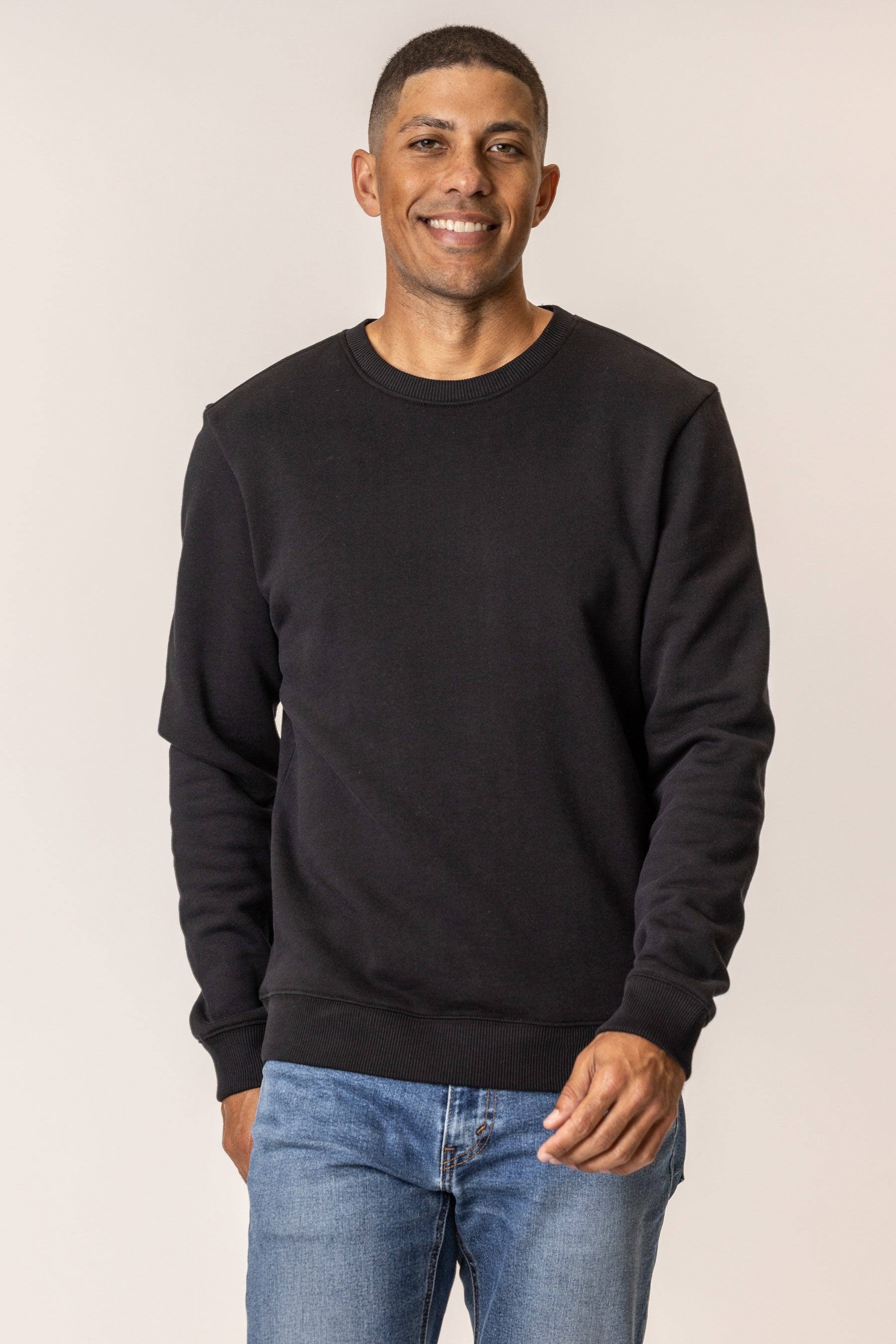 man wearing black cotton sweatshirt