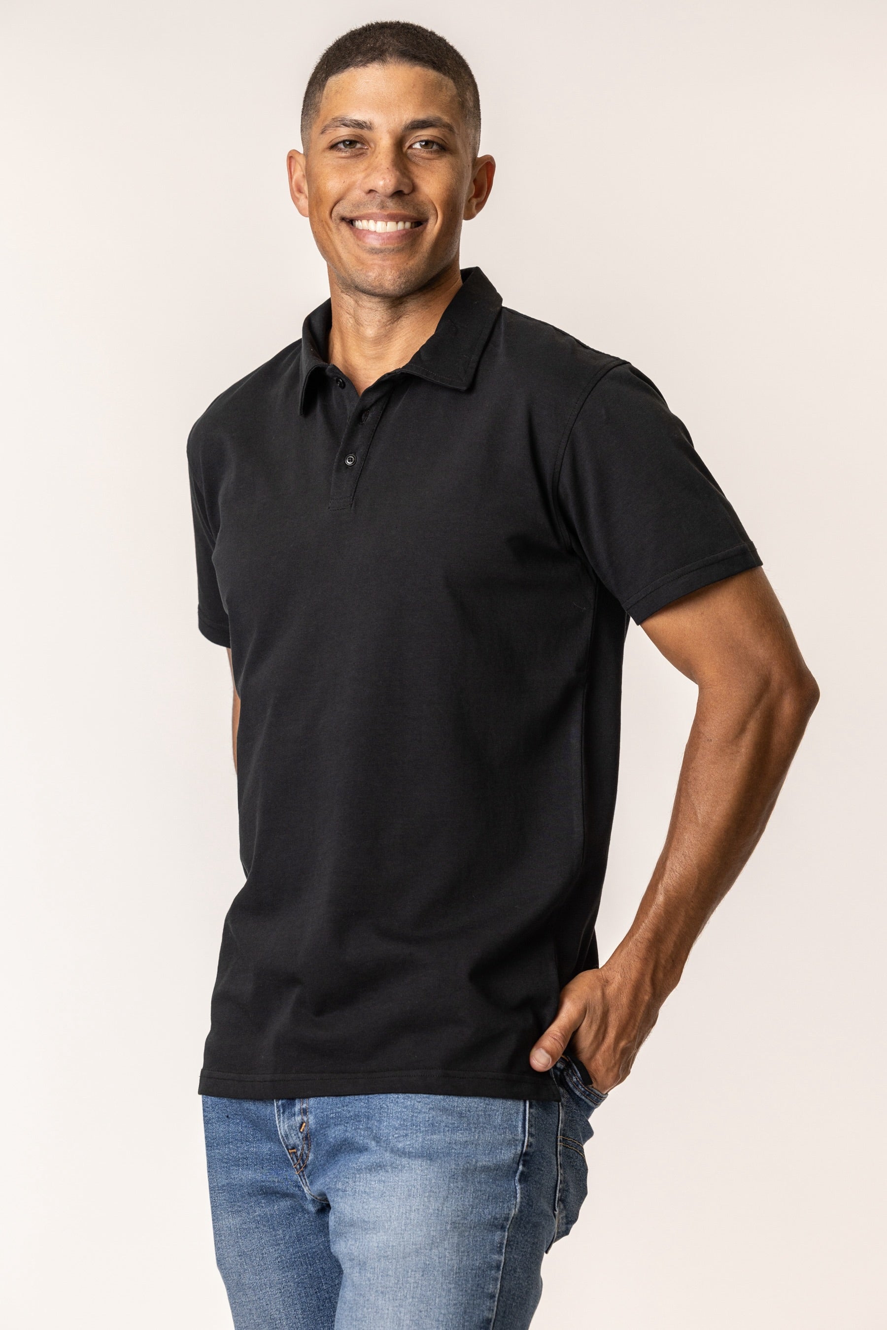 Man wearing a black polo shirt