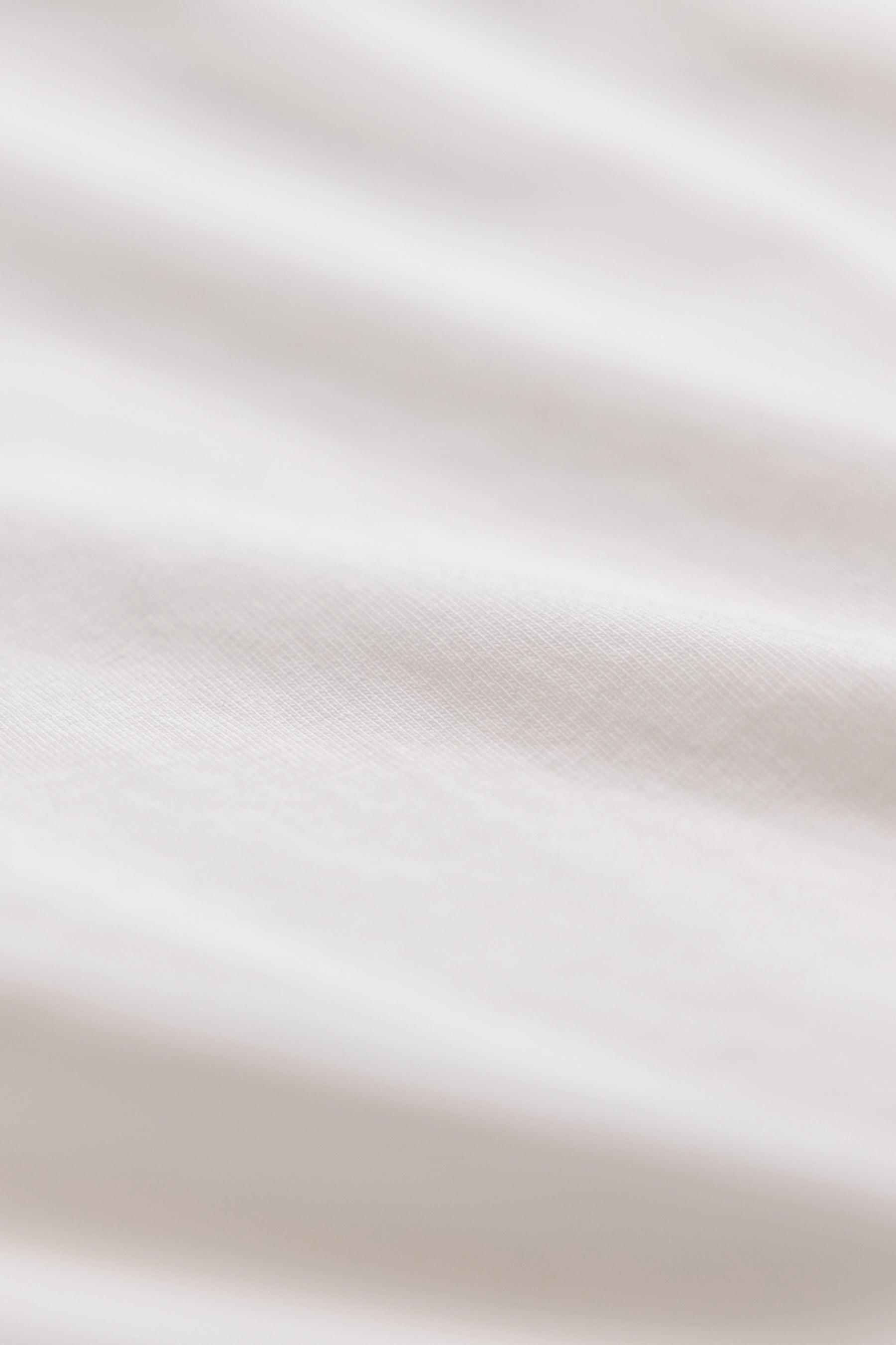 close up shot of white cotton fabric