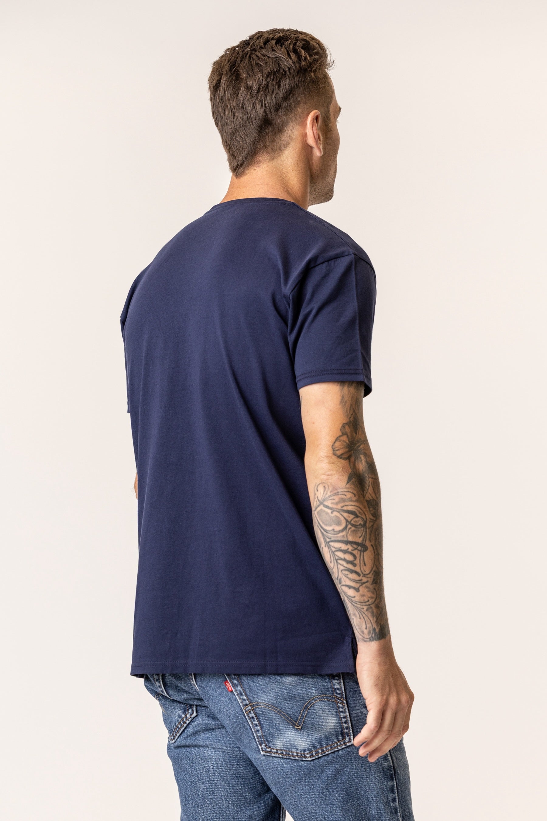 back view of regenerative organic cotton tshirt in navy blue color