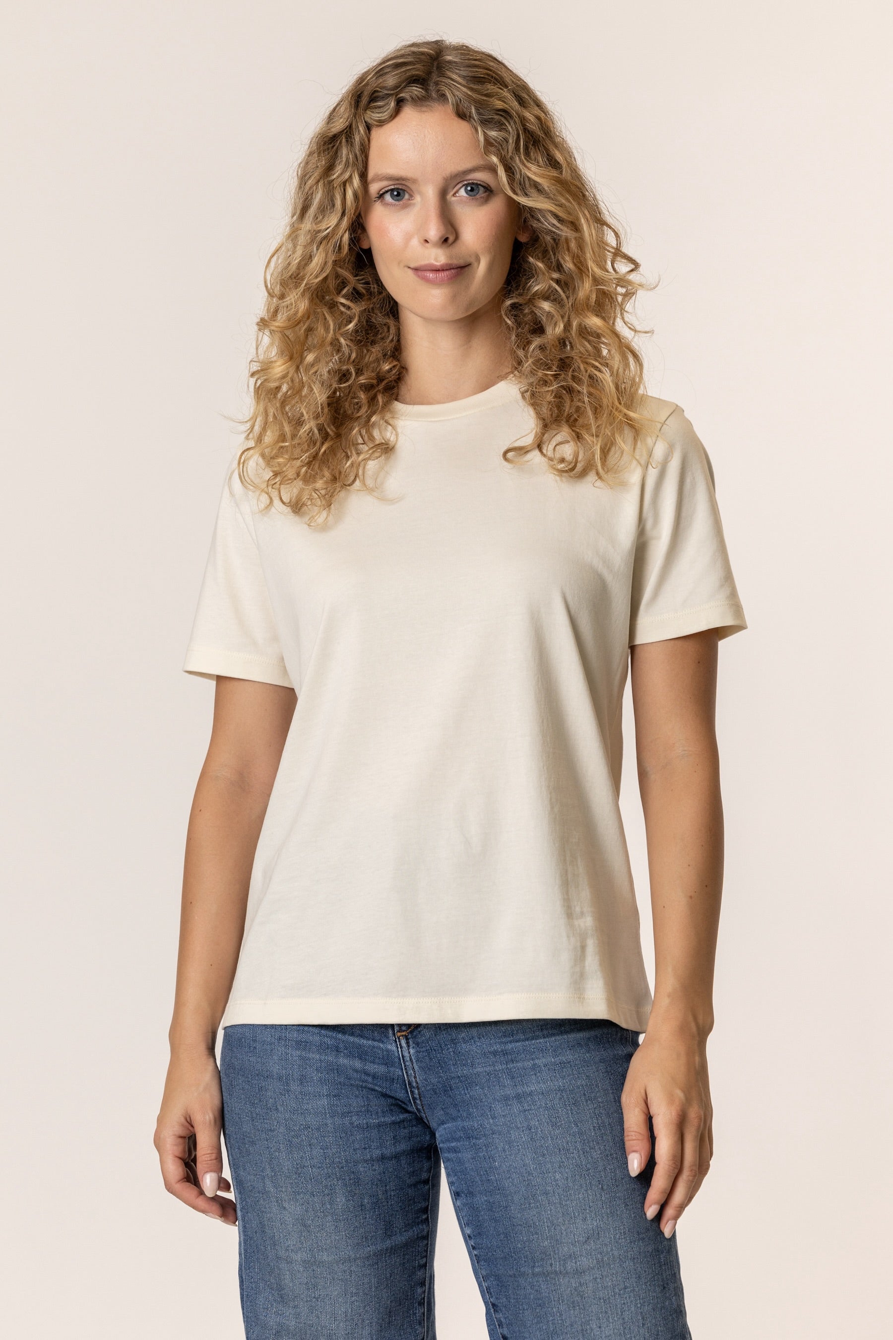 Woman wearing a plain organic cotton natural color t-shirt
