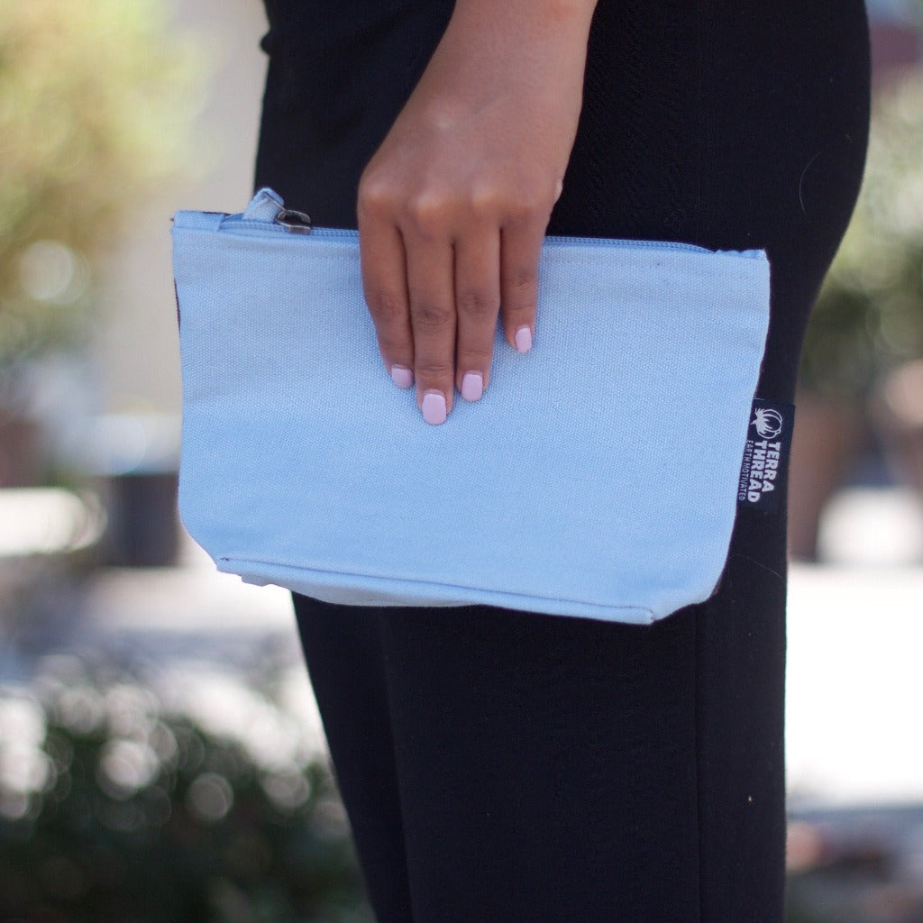 Women Holding Blue Color Cosmetic Makeup Bag