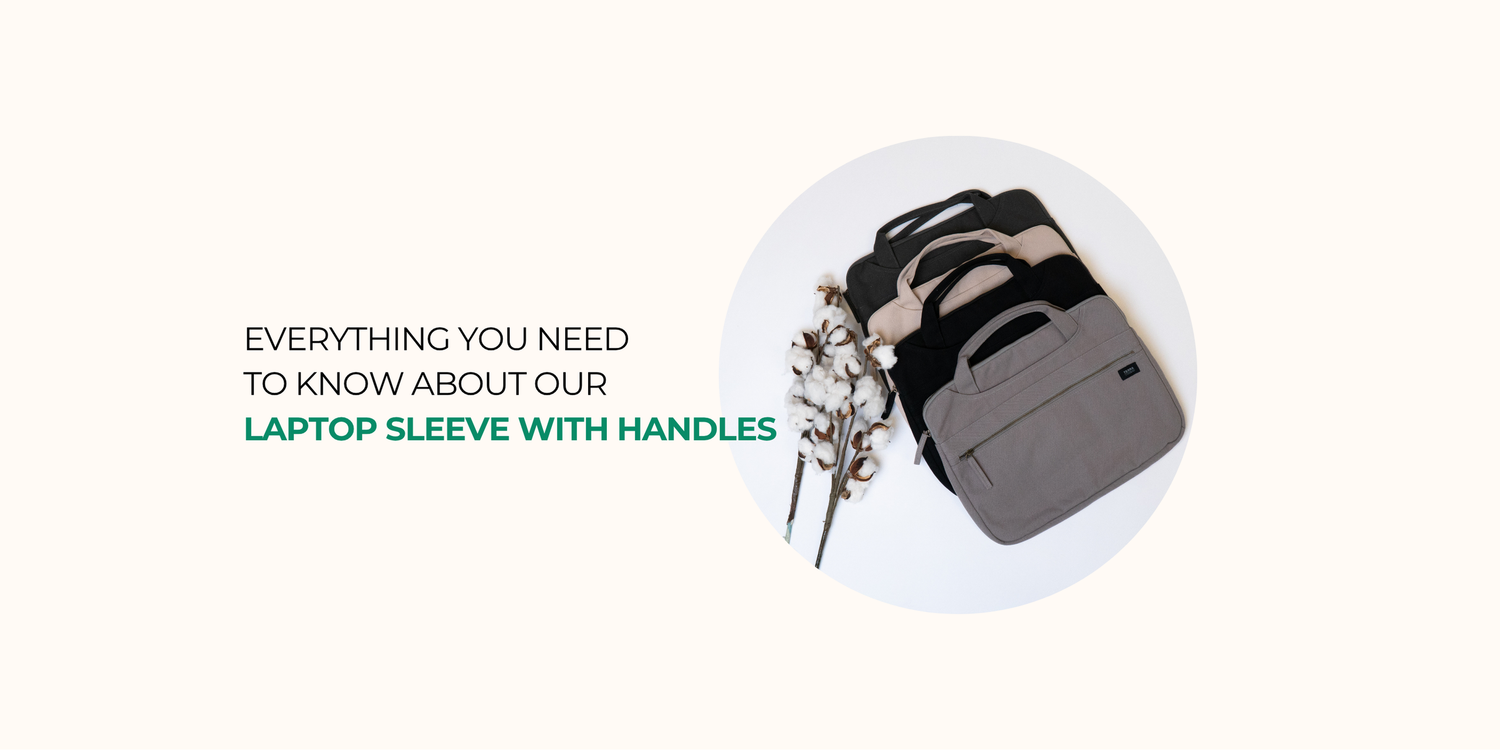 Promotional banner featuring a stack of four laptop sleeves with handles in gray, black, sand dune, and charcoal next to a cotton plant branch