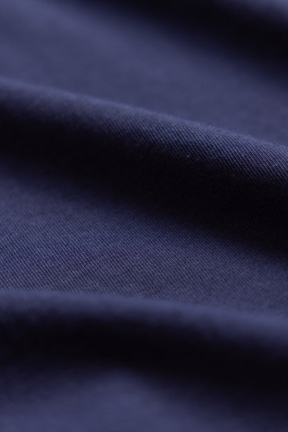 Close-up shot of navy blue polo shirt