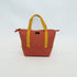 Mini canvas tote bag in orange color made from organic cotton