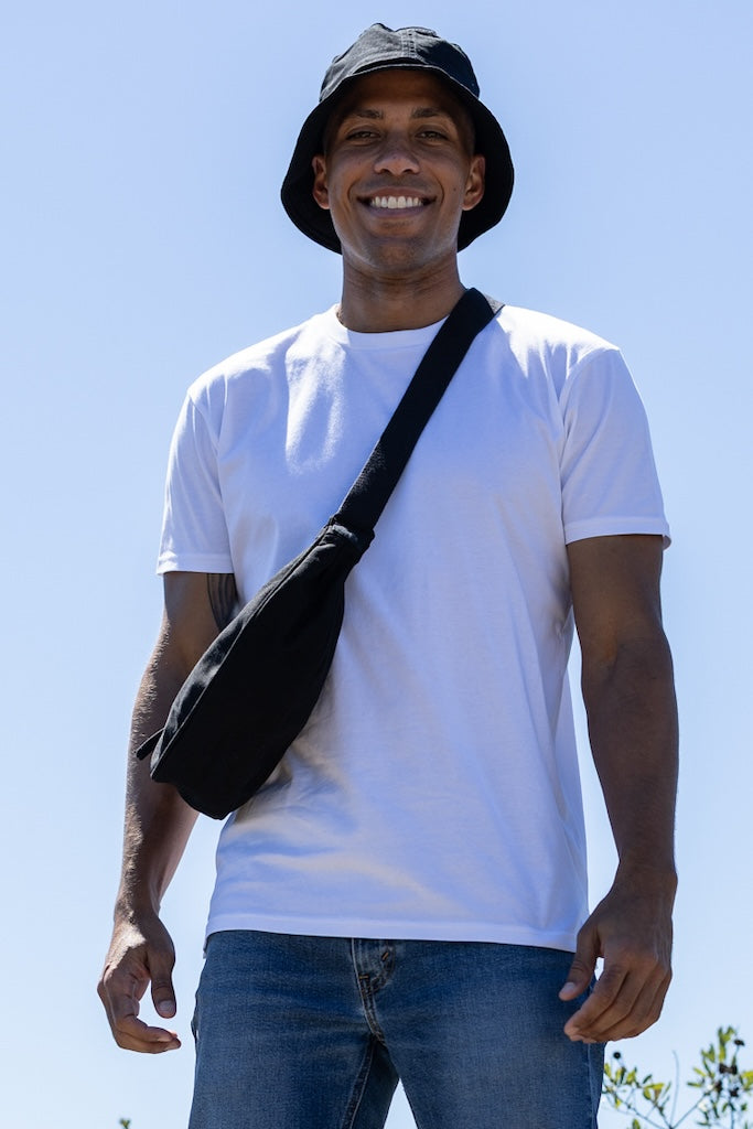 Man wearing a crossbody bag in black color