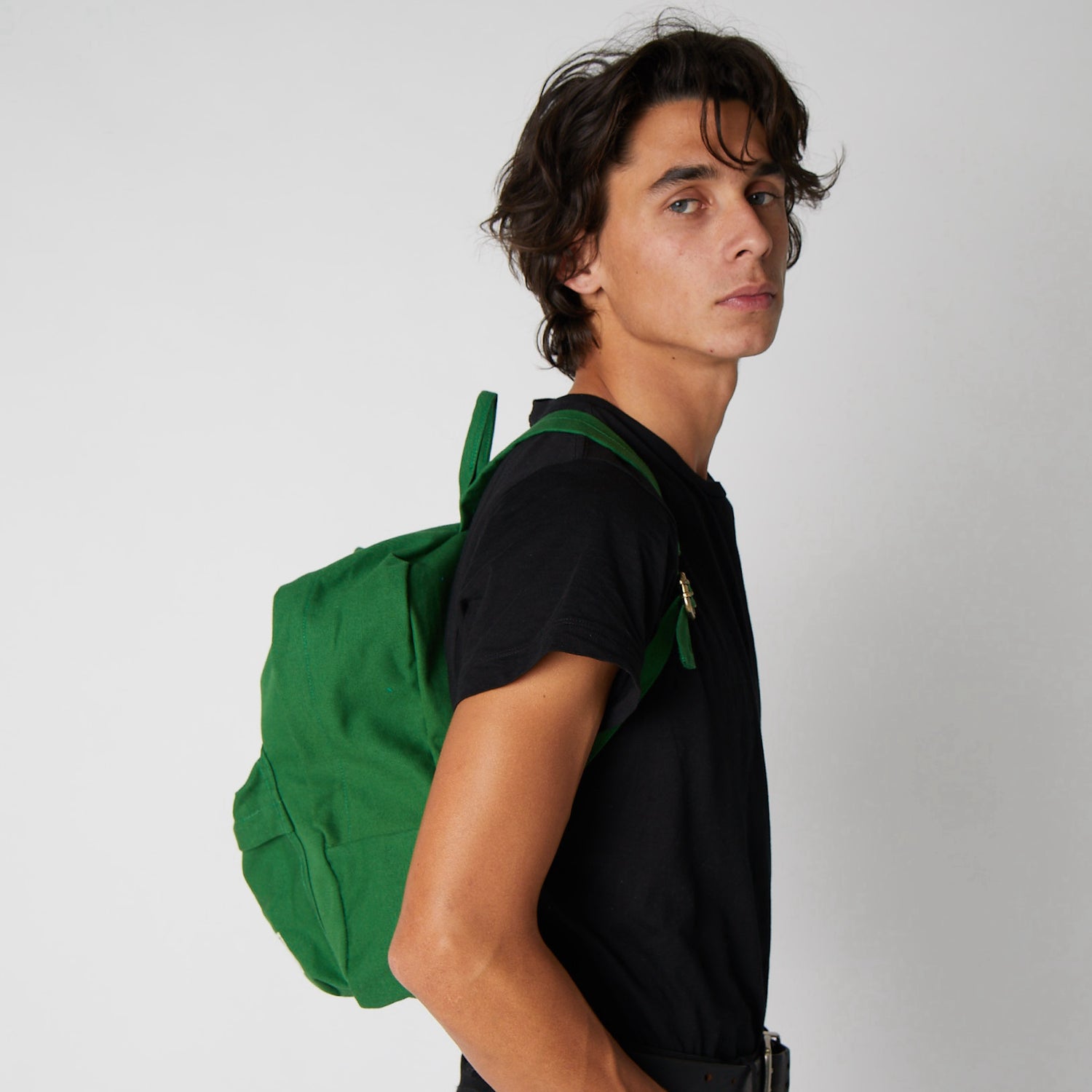 green tiny backpack
