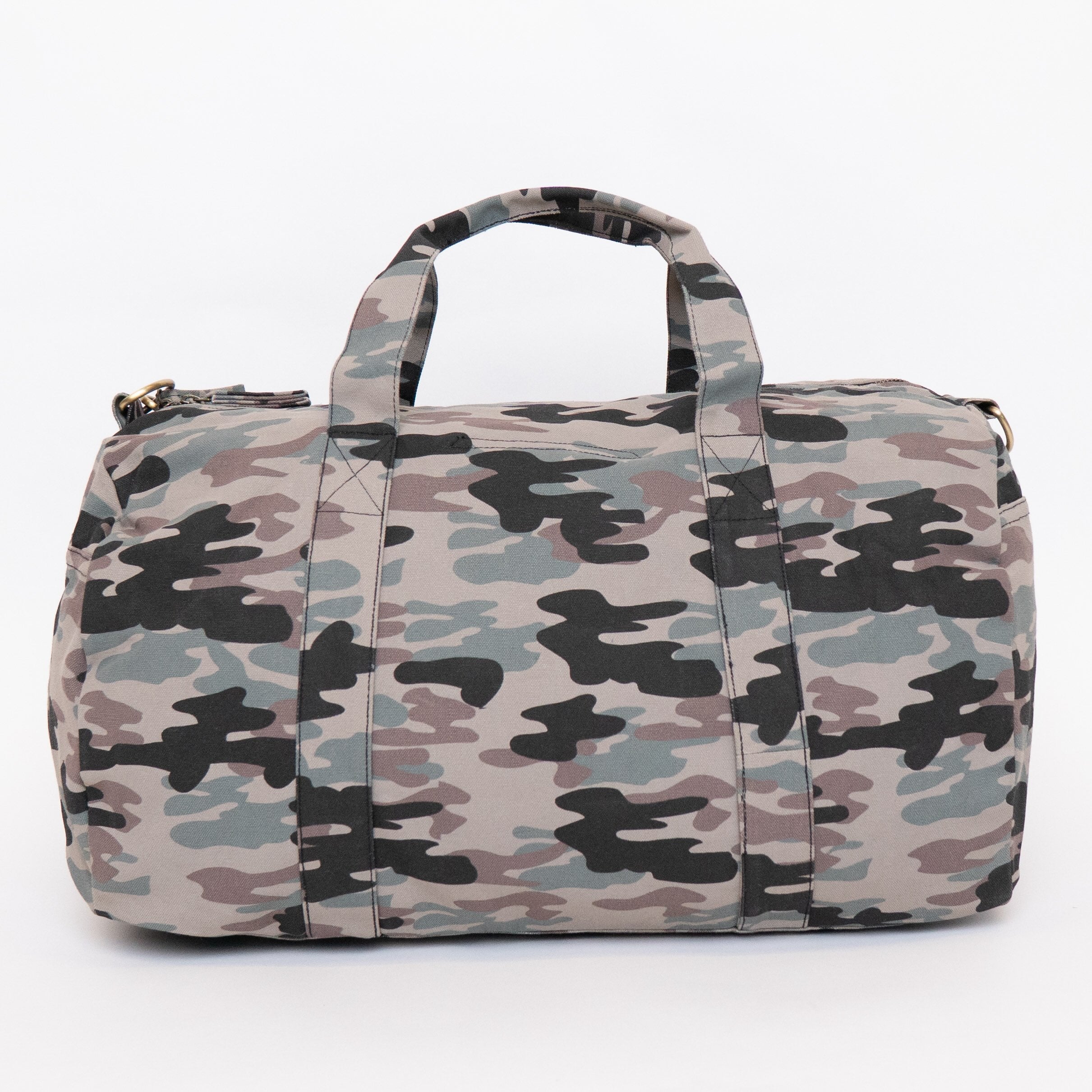 A cylindrical duffel bag with a muted camouflage pattern in gray, beige, brown, and black, featuring dual top handles and a zippered closure, shown against a plain white background.