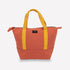 An orange color mini canvas tote bag with zipper and mustard yellow handles, and a small black brand label reading TERRA Thread