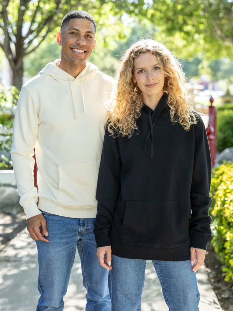 Two people wearing organic cotton pullover hoodies 