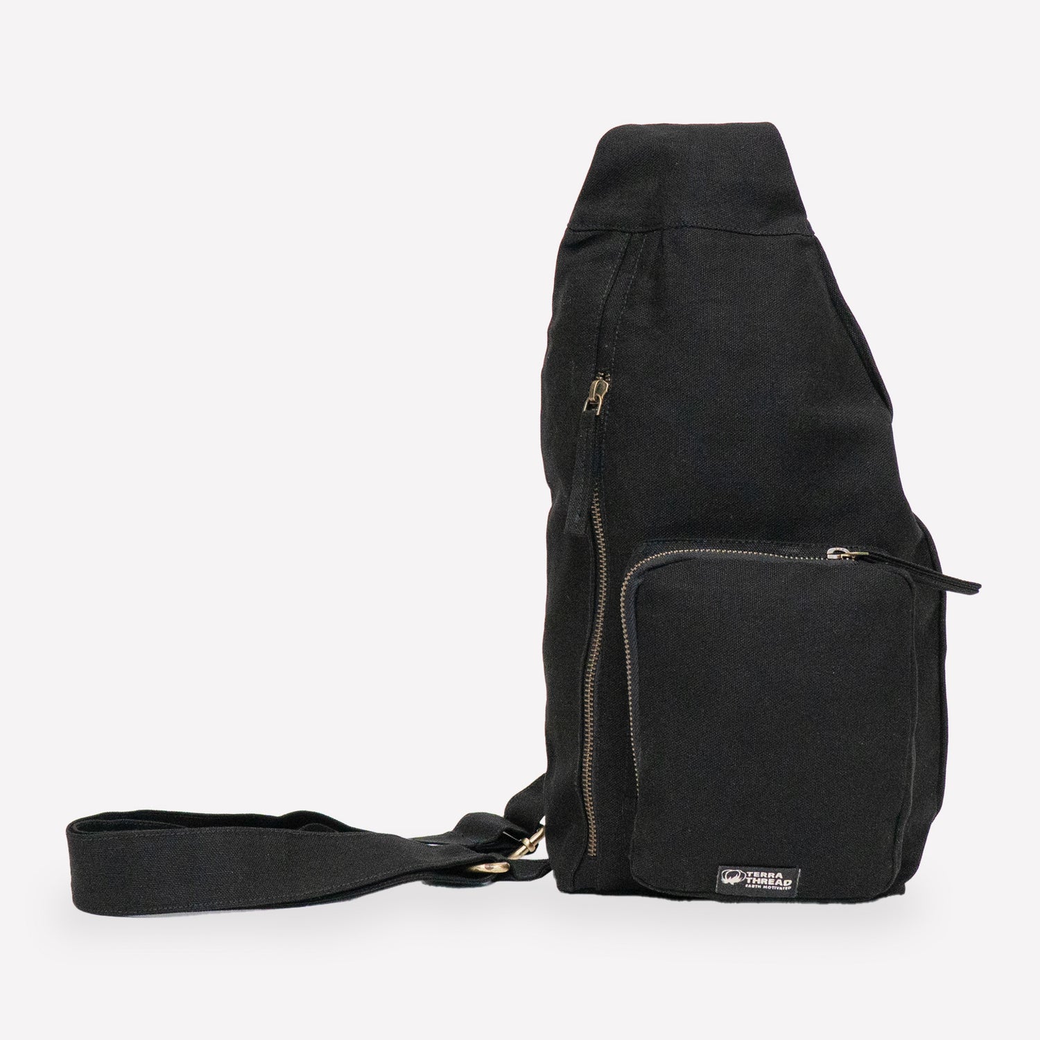 A black canvas sling bag made with organic cotton