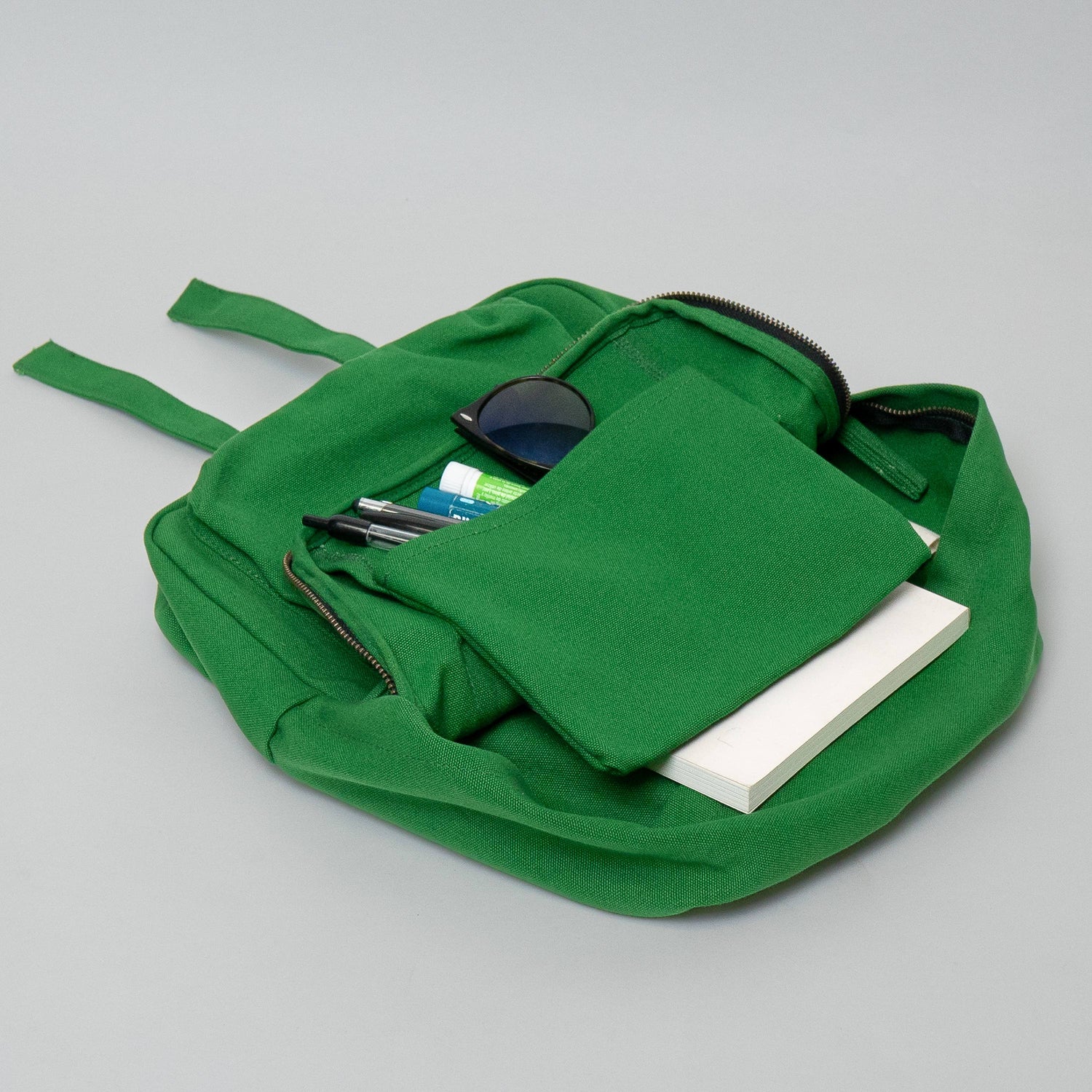 small green backpack