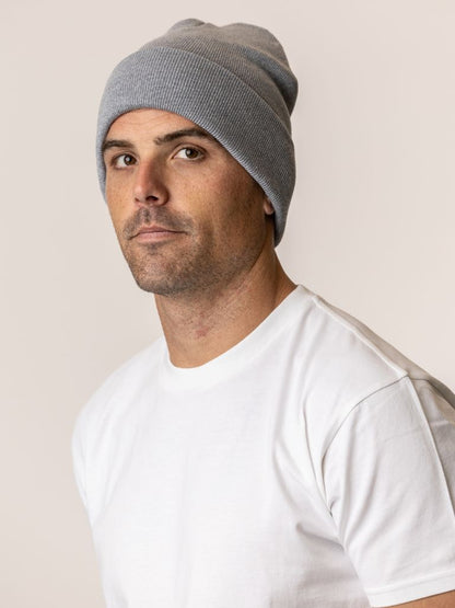 Man wearing a gray knit beanie
