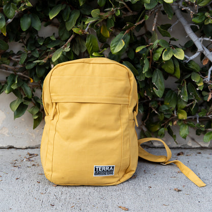 yellow canvas backpack